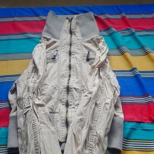 Tan jacket with turtle neck